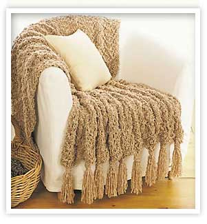 una cobija sobre un sillón